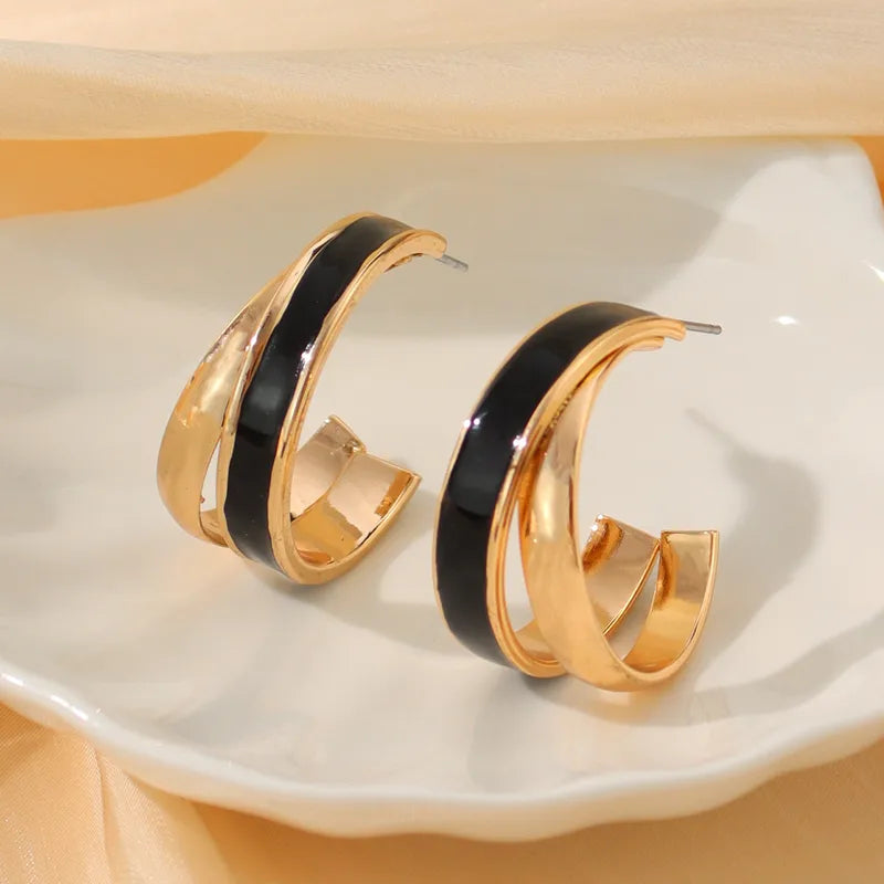 Boucles d’Oreilles Anneaux Géométriques – Noir & Or – Élégance Moderne