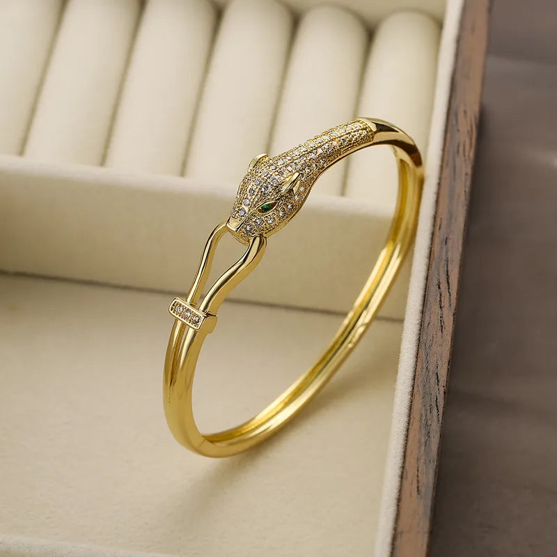 Bracelet tête de panthère doré – zircons scintillants