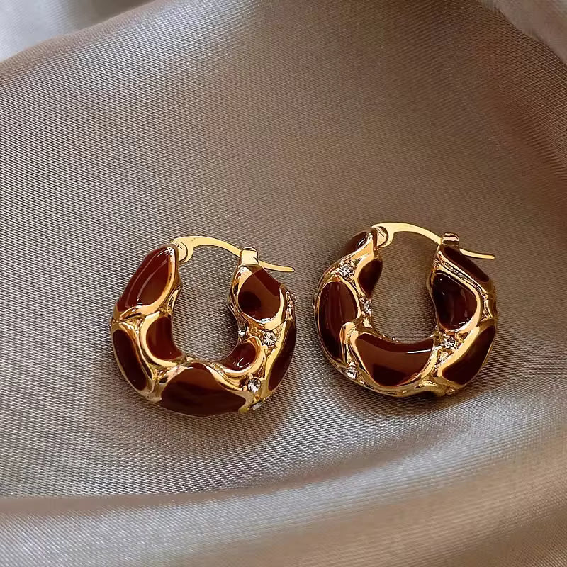 Boucles d’oreilles goutte rouge et strass dorés
